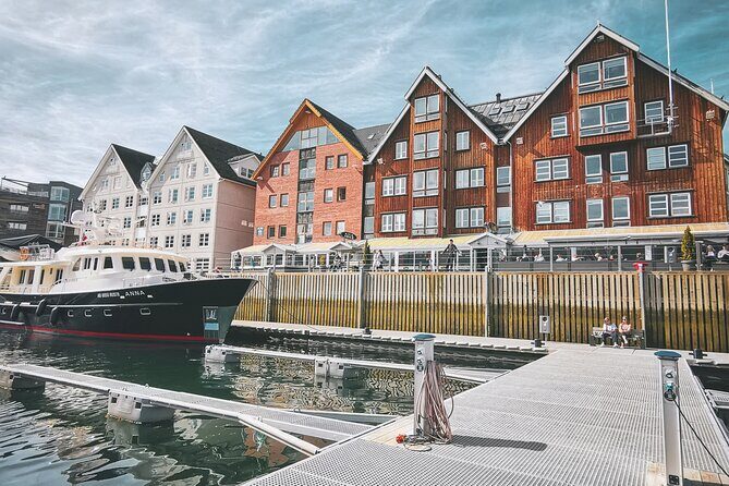 Discover the most Photogenic Spots of Tromsø with a Local - Storgata (Stortorget 2): old wooden houses, cafes, and event energy