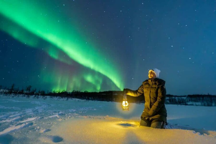 From Tromsø: Aurora Minibus Chase with Portrait and Hot Meal - Campfire comfort and the heated tent with toilet