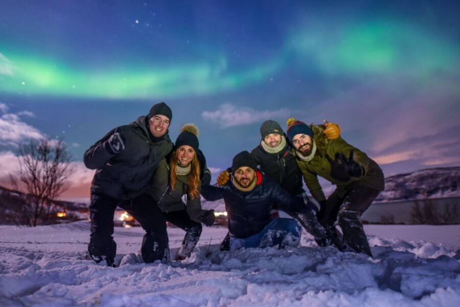From Tromsø: Northern Lights Tour - The core experience: thermal suits, bonfire warmth, and dinner outside