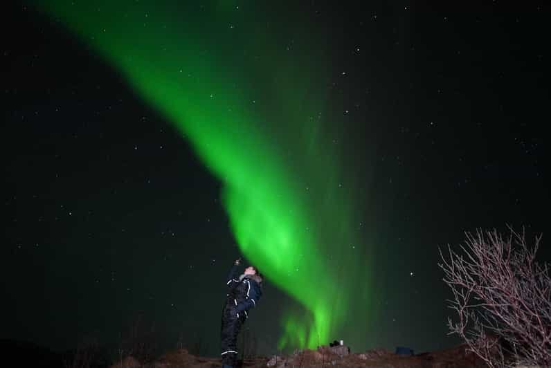 From Tromsø: Northern Lights Tour with Hot Drinks and Photos - Suiting up: warm suits, shoe spikes, and head lamps