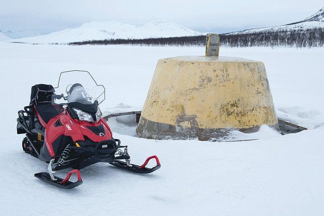 Snowmobile Adventure to 3-Country Border - Snowmobile basics: safety briefing, driver rules, and the deductible