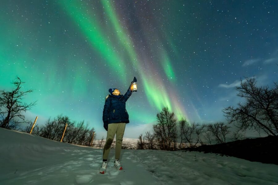 Tromsø: Aurora Borealis, Campfire, Hot Meal, Arctic Tour - Thermal suits, a short walk, and campfire warmth that changes the whole mood