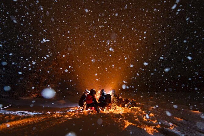 Tromso Aurora Hunt with Bonfire, Soup, Winter Gear & Transfers - How the Guide Hunts the Aurora (Including Possible Finland Crossings)