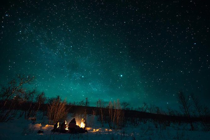 Tromso Aurora Hunt with Bonfire, Soup, Winter Gear & Transfers - English-Language Guides and Photo Help That Actually Helps