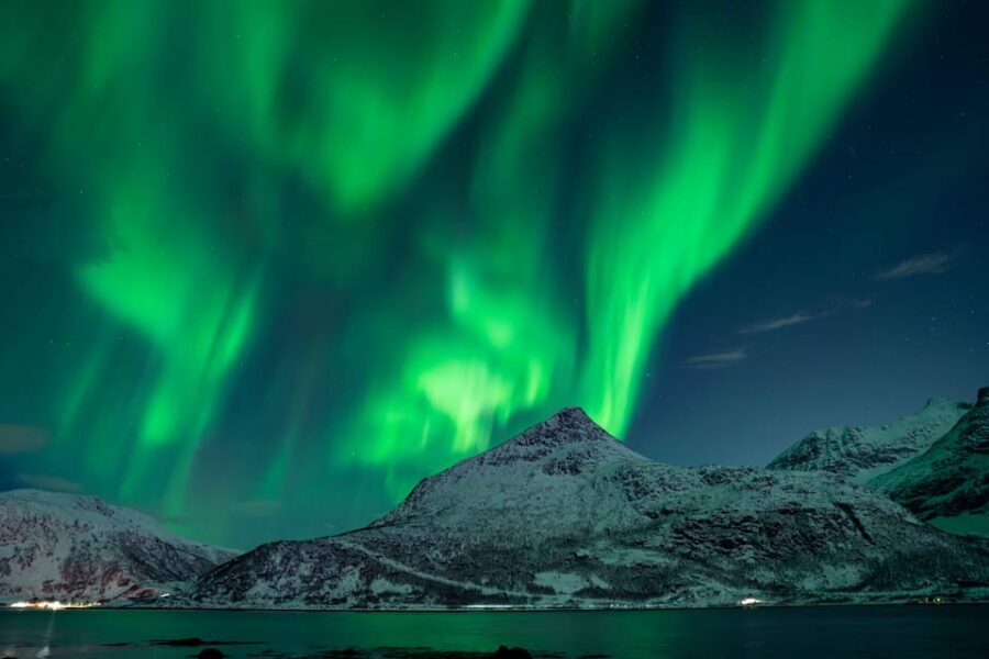 Tromsø: Aurora Tour with Photos, Campfire and Arctic Food - Chasing clear skies: driving beyond city lights