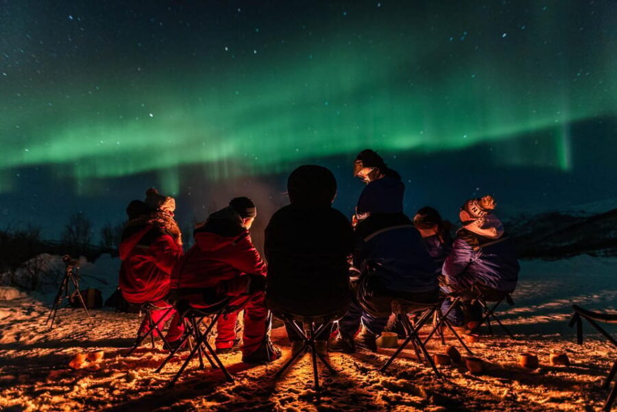 Tromsø: Aurora Tour with Photos, Campfire and Arctic Food - Warmth gear, rough terrain, and how photos get handled