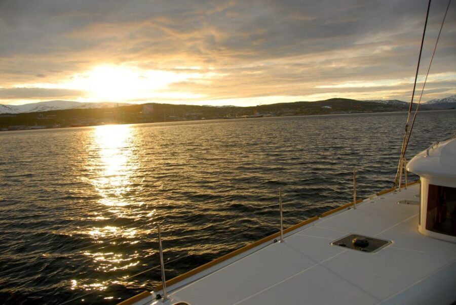Tromsø: Midnight Sun Cruise in a Luxury Catamaran - The cruise route: crisp water, mountain silhouettes, and light that keeps changing