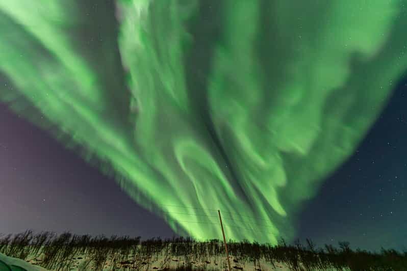 Tromsø: Northern Lights Tour w/Photo, Suits and Local Guide - Meeting Tom in Tromsø and getting set for the cold